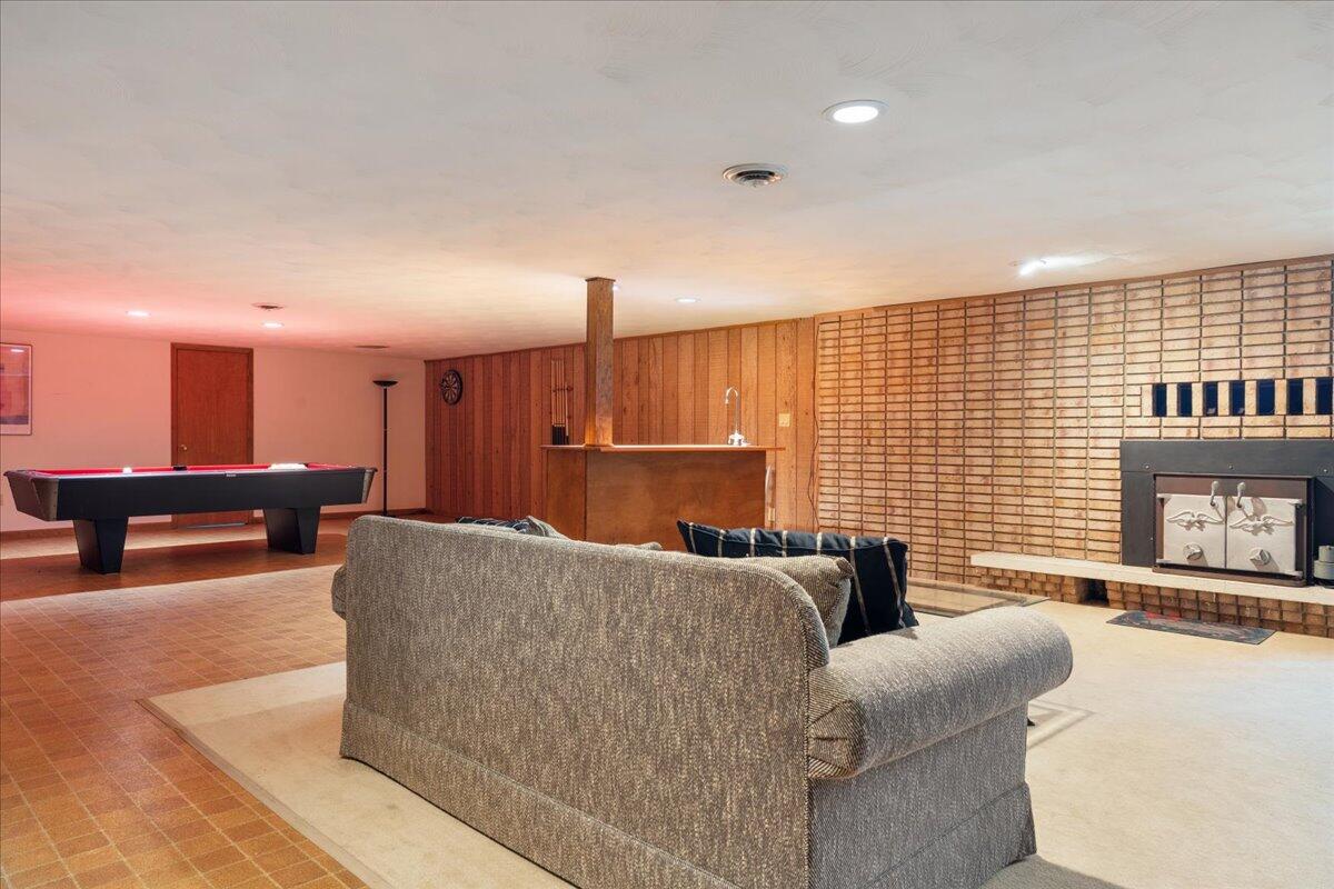 453 Wirtz Road Wirtz, VA 24184 - Photo 50 of 72 a living room with furniture and a flat screen tv