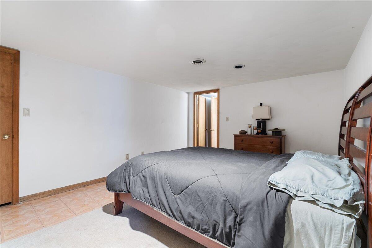 453 Wirtz Road Wirtz, VA 24184 - Photo 54 of 69 a bedroom with a bed and window