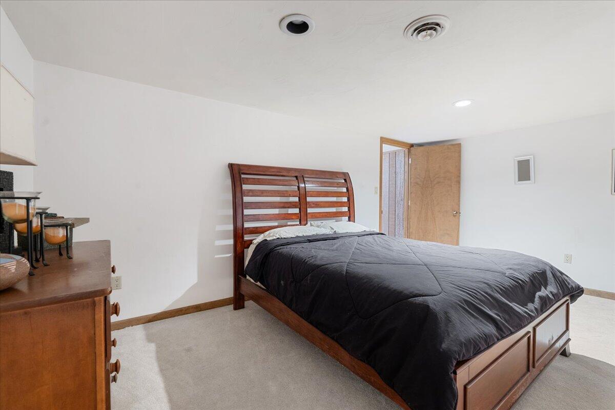 453 Wirtz Road Wirtz, VA 24184 - Photo 55 of 69 a bedroom with a bed and a desk