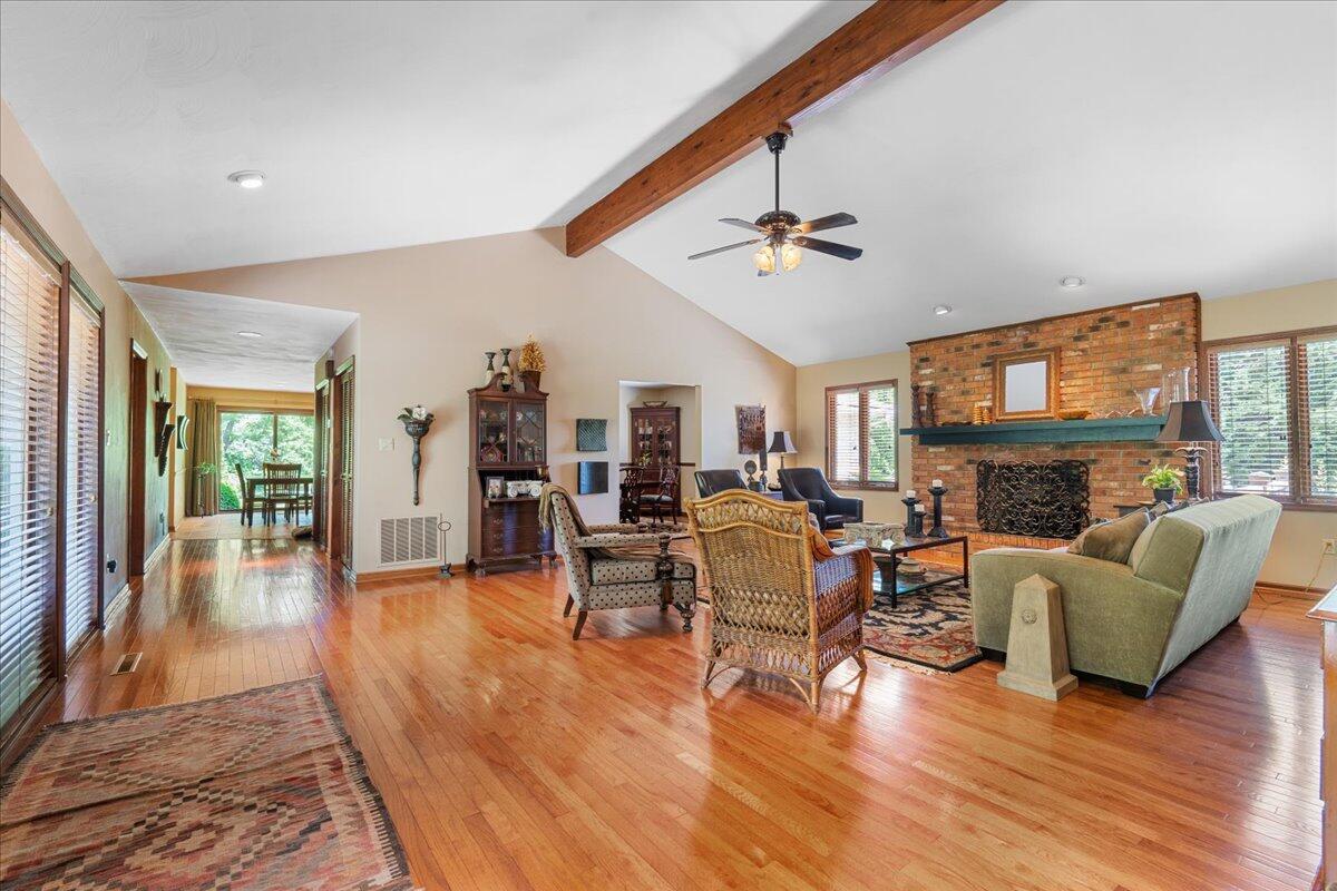 453 Wirtz Road Wirtz, VA 24184 - Photo 9 of 69 a living room with fireplace furniture and a wooden floor