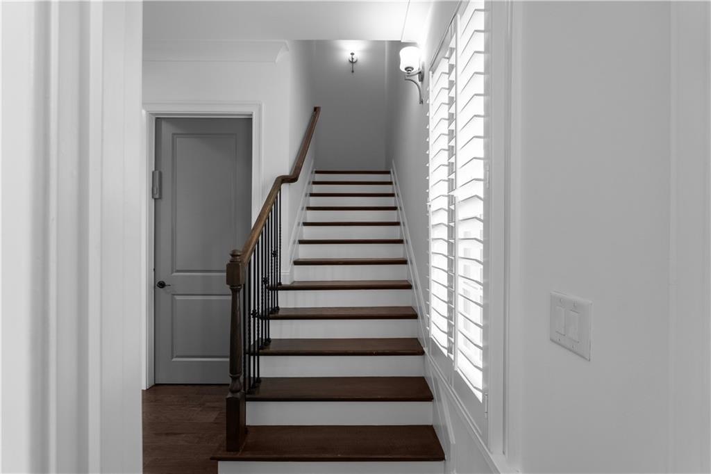 6408 Radiant Trace Atlanta, GA 30328 - Photo 19 of 40 a view of entryway with wooden floor