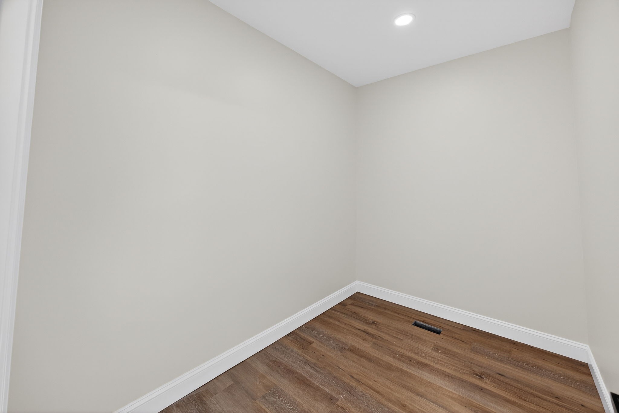 6572 Thomas Twin Oaks Road Baxter, TN 38544 - Photo 17 of 30 a view of an empty room with wooden floor