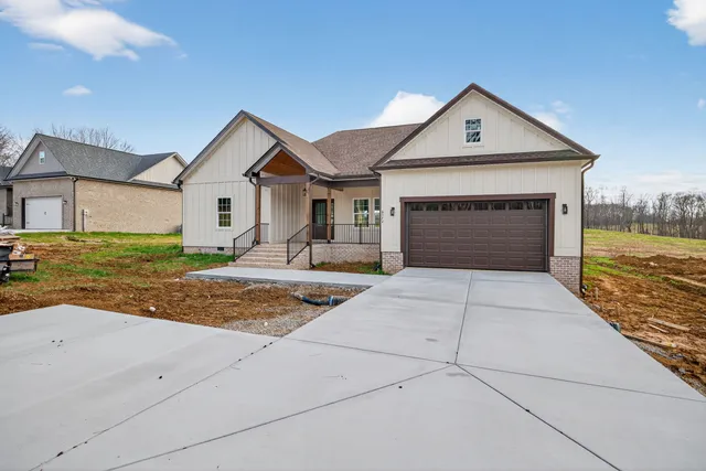 a front view of a house with yard