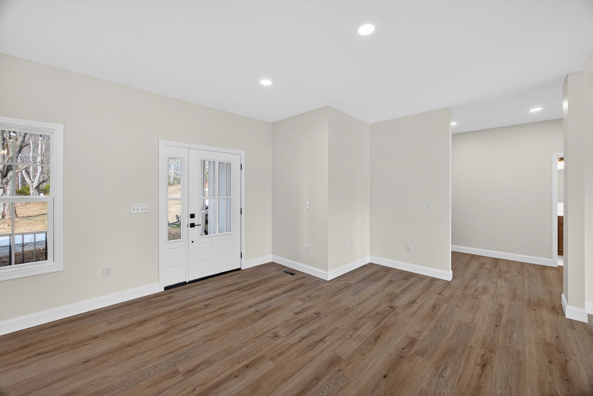 6572 Thomas Twin Oaks Road Baxter, TN 38544 - Photo 3 of 30 a view of an empty room with wooden floor and a window