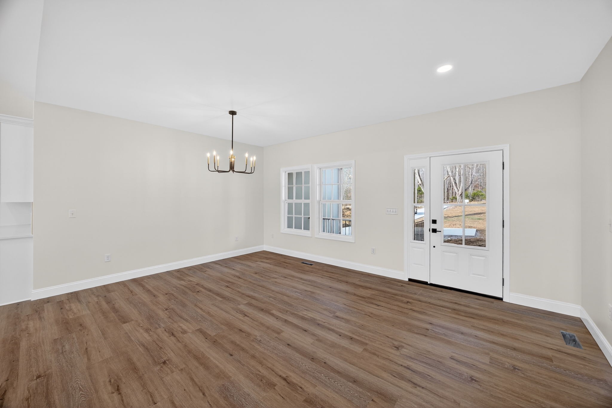 6572 Thomas Twin Oaks Road Baxter, TN 38544 - Photo 4 of 30 wooden floor in an empty room with a window