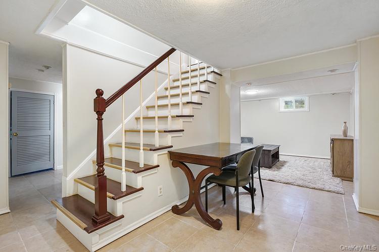 199 S Road White Plains, NY 10603 - Photo 14 of 17 a view of entryway with dining room and stairs