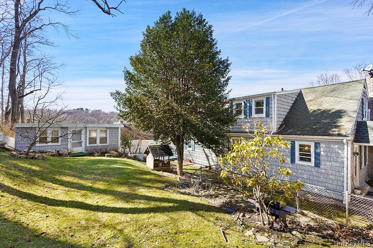 199 S Road White Plains, NY 10603 - Photo 17 of 17 a view of a house with a big yard and large tree
