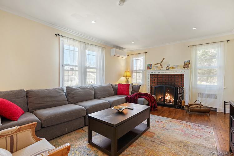 199 S Road White Plains, NY 10603 - Photo 2 of 17 a living room with furniture and a fireplace