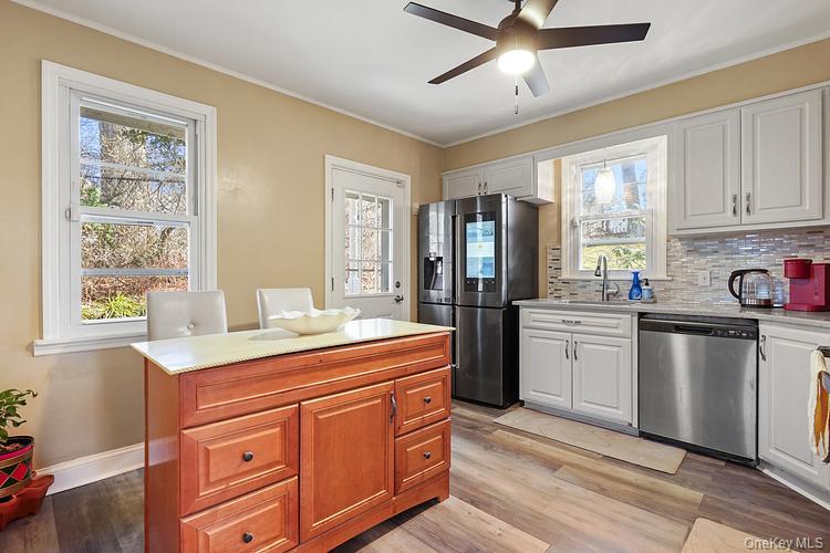 199 S Road White Plains, NY 10603 - Photo 6 of 17 a kitchen with stainless steel appliances granite countertop a sink stove and refrigerator