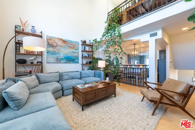 a outdoor living space with furniture and a potted plant