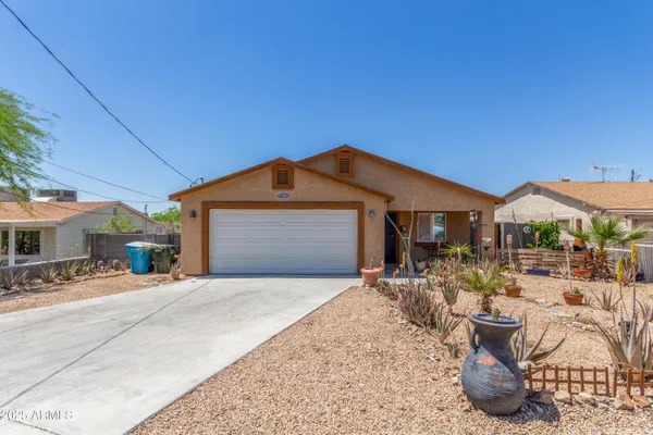 a front view of a house with patio