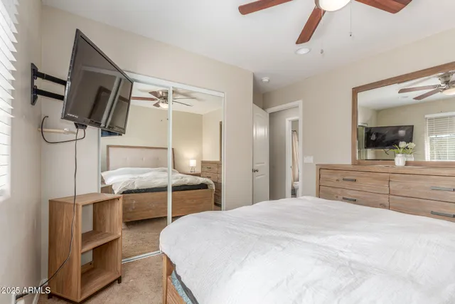 a kitchen with kitchen island stainless steel appliances a stove refrigerator and microwave