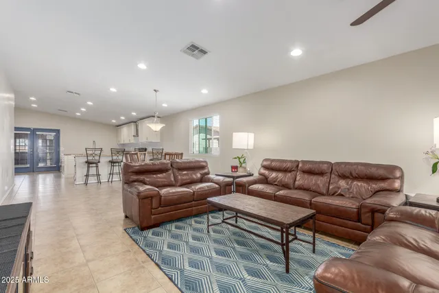 a living room with furniture and a couch