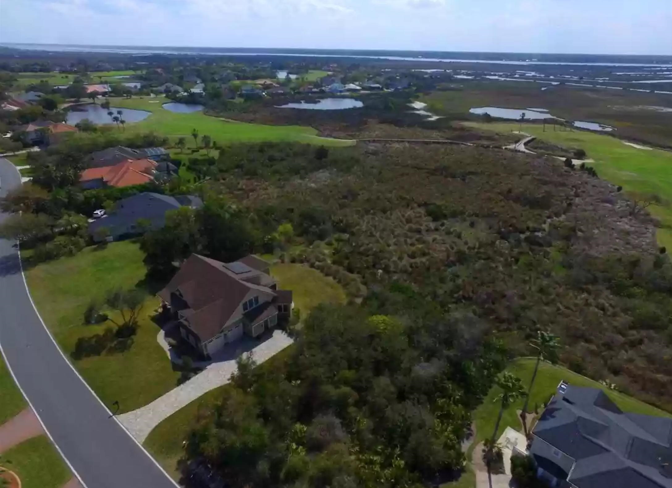 143 Marshside Drive St. Augustine, FL 32080 - Photo 8 of 16 a view of lake with mountain view