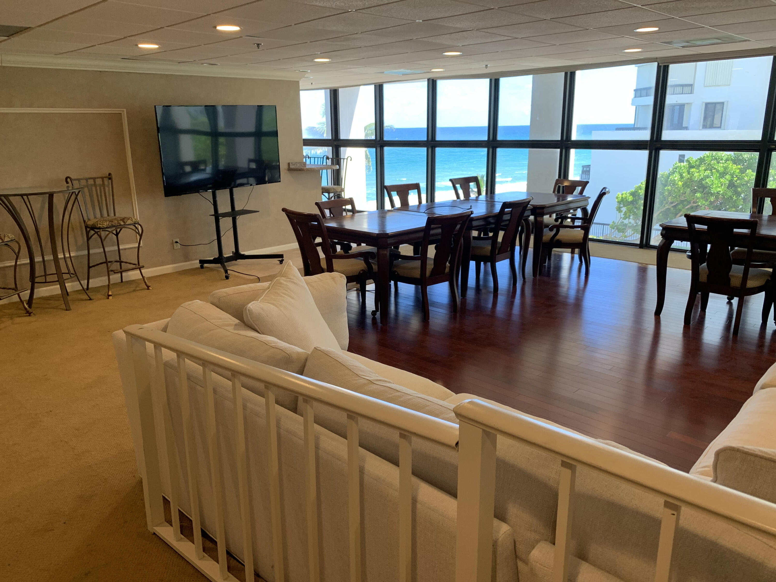 3115 South Ocean Boulevard, Unit 1002 Highland Beach, FL 33487 - Photo 30 of 37 a view of a dining room with furniture window and outside view
