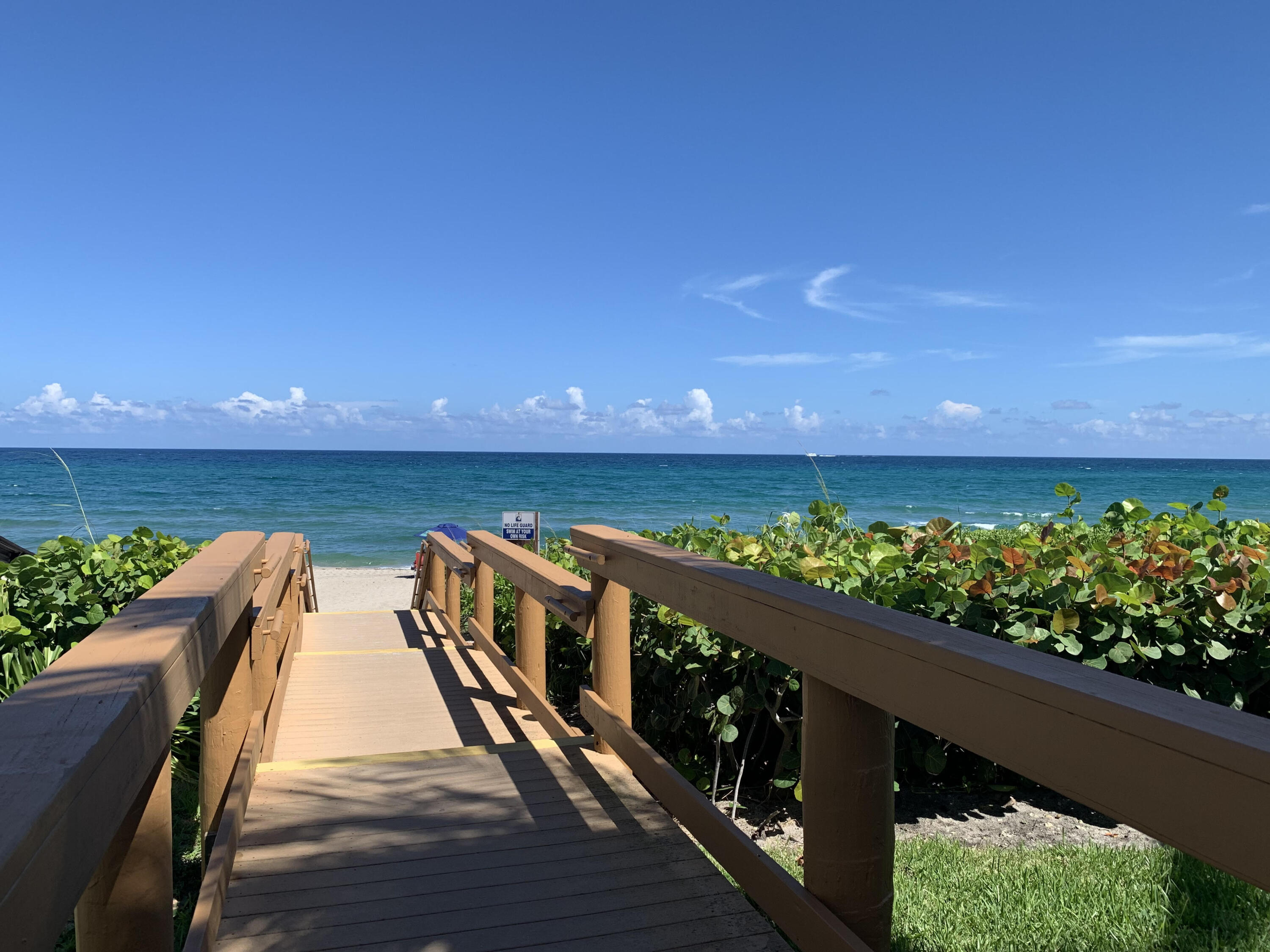 3115 South Ocean Boulevard, Unit 1002 Highland Beach, FL 33487 - Photo 37 of 37 a view of wooden floor and a chair