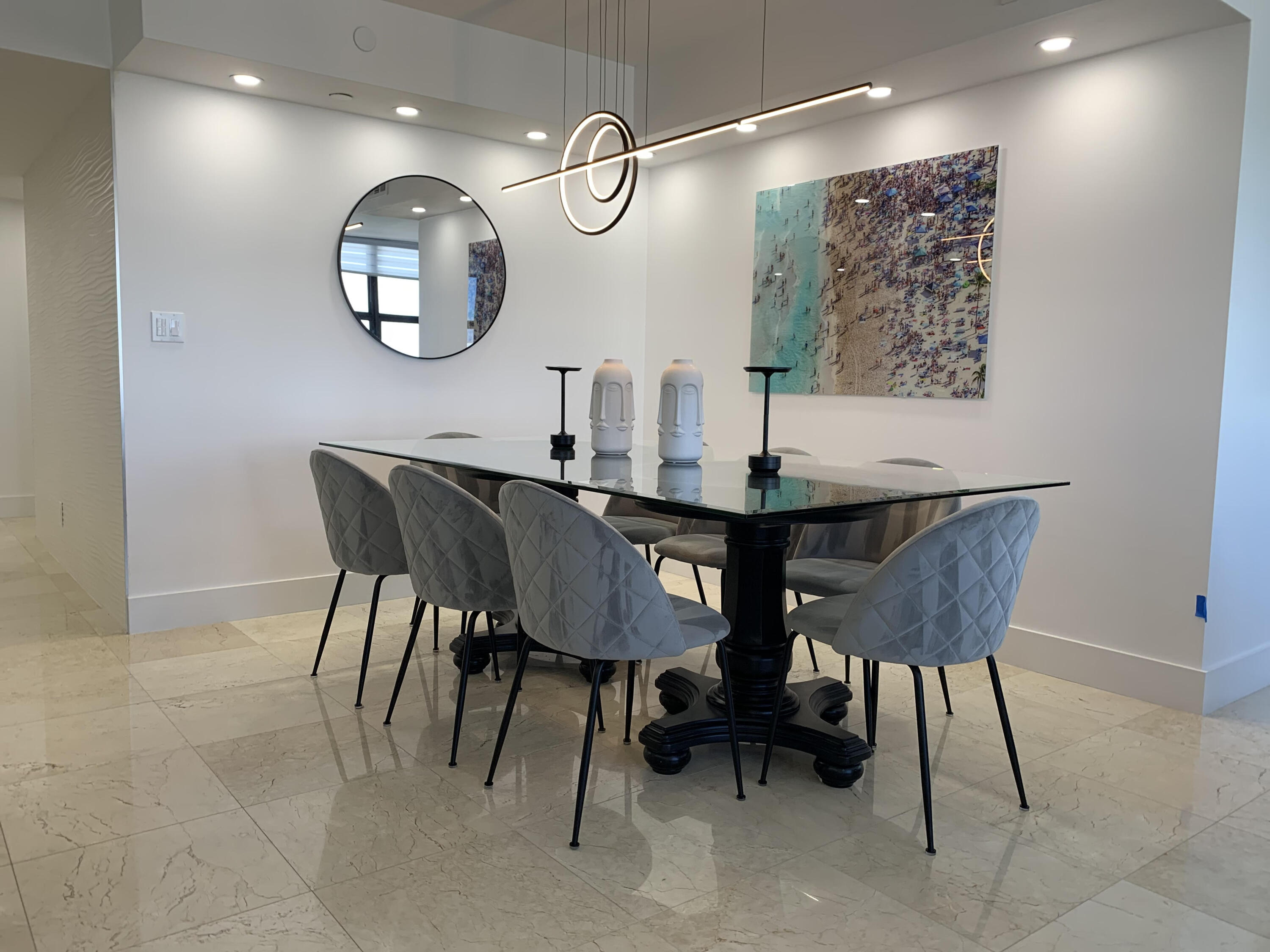3115 South Ocean Boulevard, Unit 1002 Highland Beach, FL 33487 - Photo 7 of 37 a view of a dining room with furniture