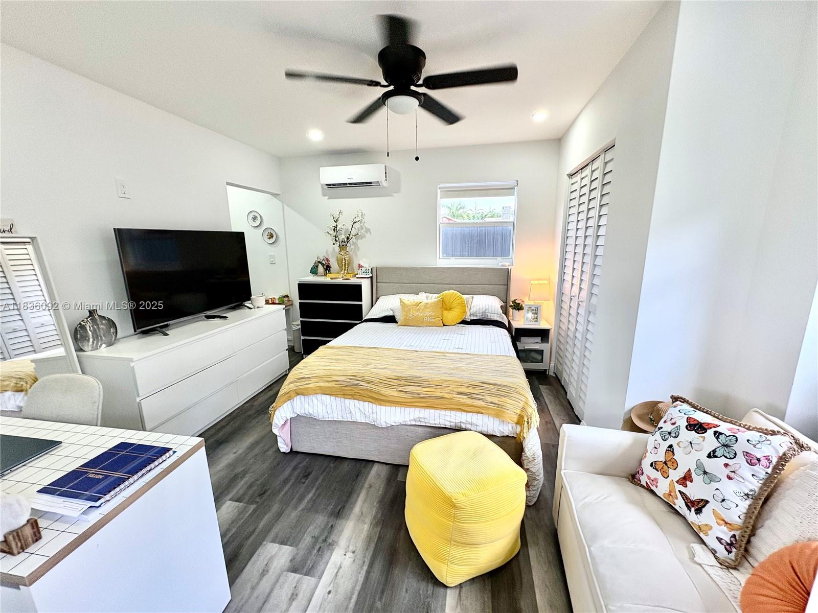 3320 Southwest 139th Avenue Miami, FL 33175 - Photo 17 of 23 a bedroom with furniture and a flat screen tv