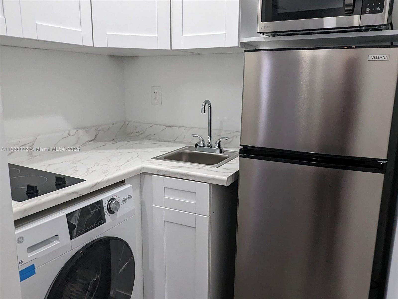 3320 Southwest 139th Avenue Miami, FL 33175 - Photo 20 of 23 a utility room with dryer and washer