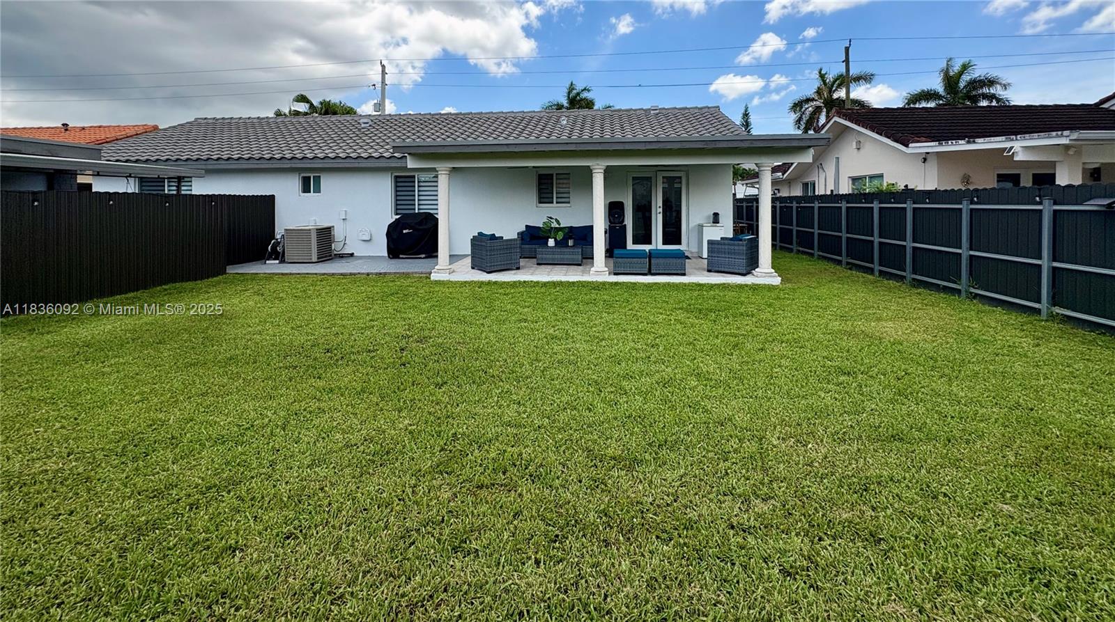 3320 Southwest 139th Avenue Miami, FL 33175 - Photo 22 of 23 a view of a house with backyard and porch