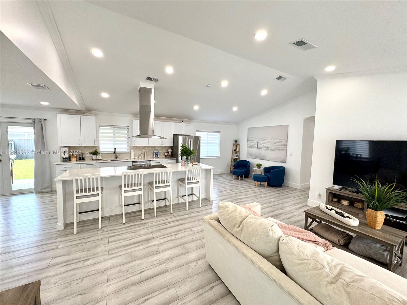 3320 Southwest 139th Avenue Miami, FL 33175 - Photo 3 of 23 a living room with furniture and a flat screen tv