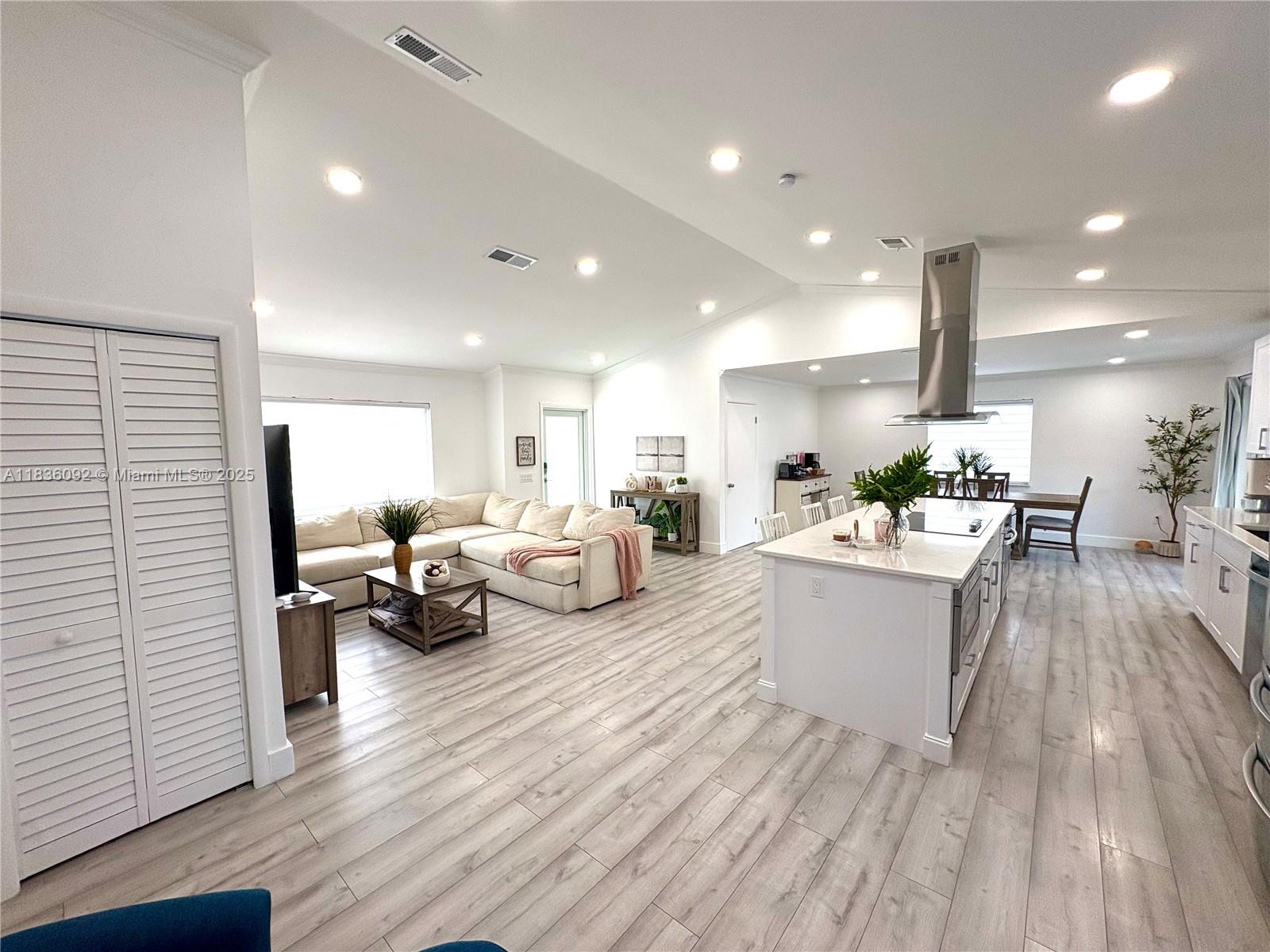 3320 Southwest 139th Avenue Miami, FL 33175 - Photo 7 of 23 a living room with furniture and a wooden floor