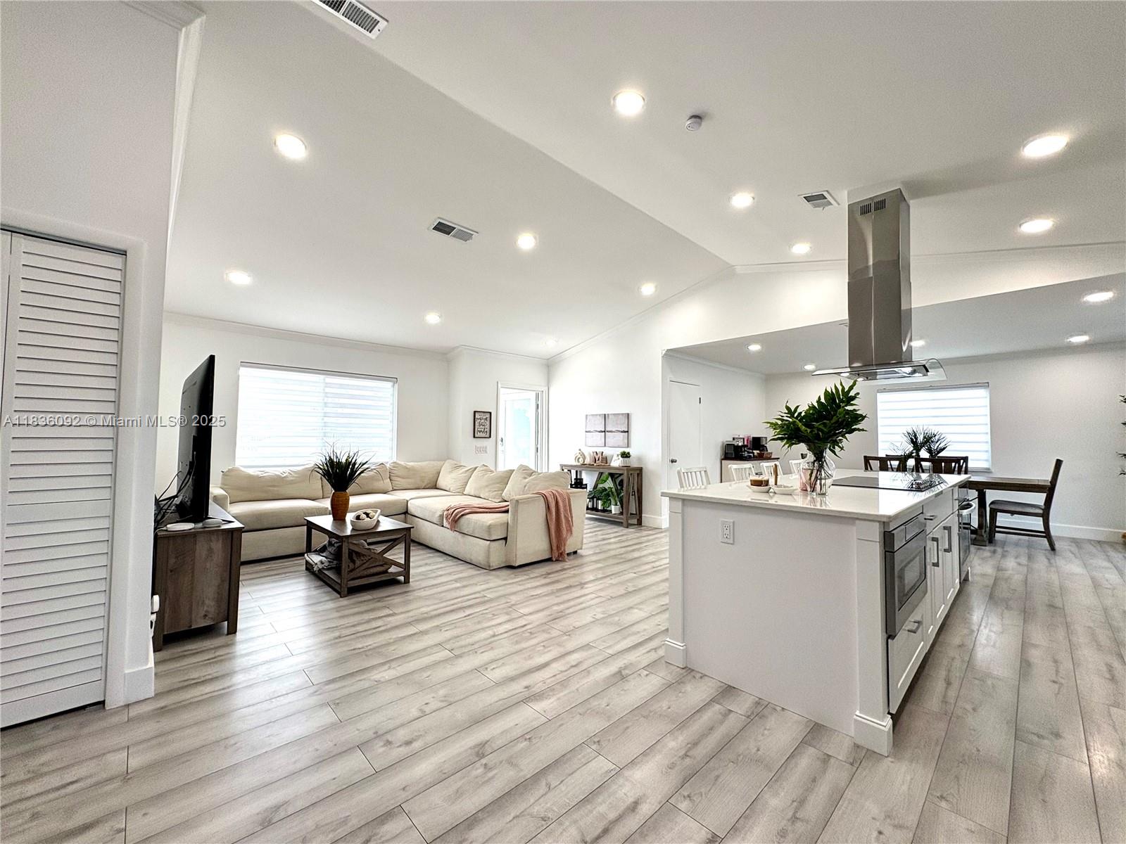 3320 Southwest 139th Avenue Miami, FL 33175 - Photo 9 of 23 a living room with furniture and a wooden floor