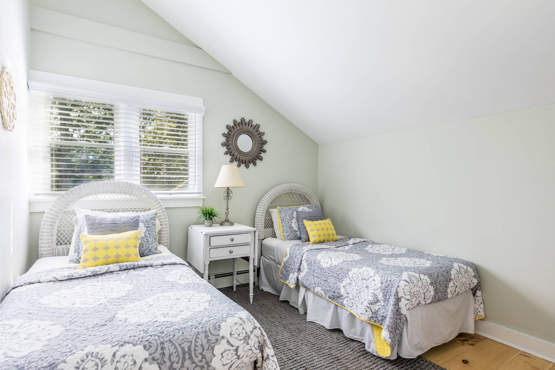 3 Spring Cl Lane East Hampton, NY 11937 - Photo 11 of 14 a bedroom with a bed a painting and a window