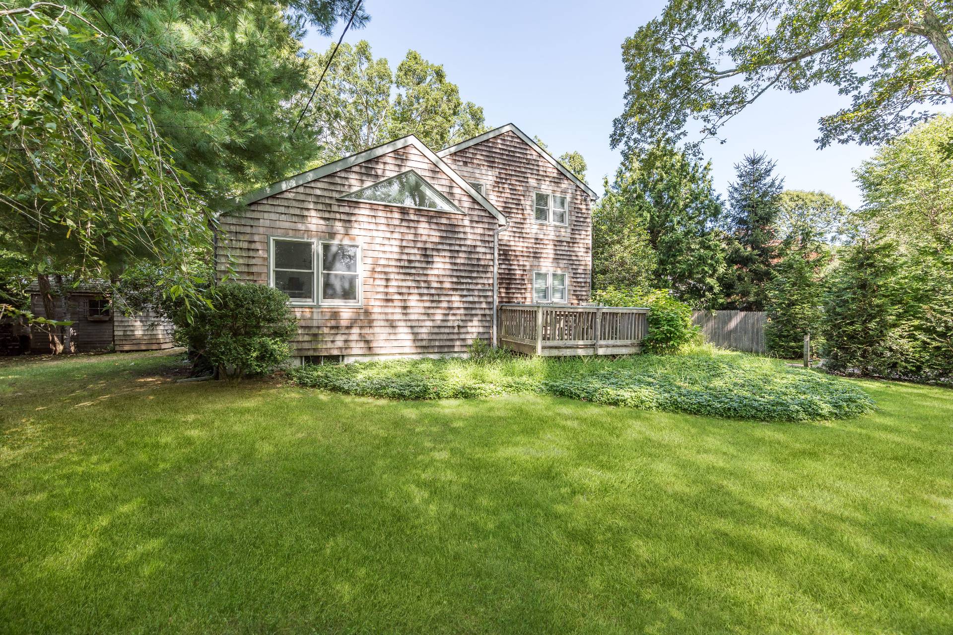 3 Spring Cl Lane East Hampton, NY 11937 - Photo 5 of 14 a view of a house with a yard
