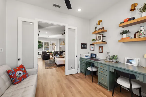 a living room with furniture and a window