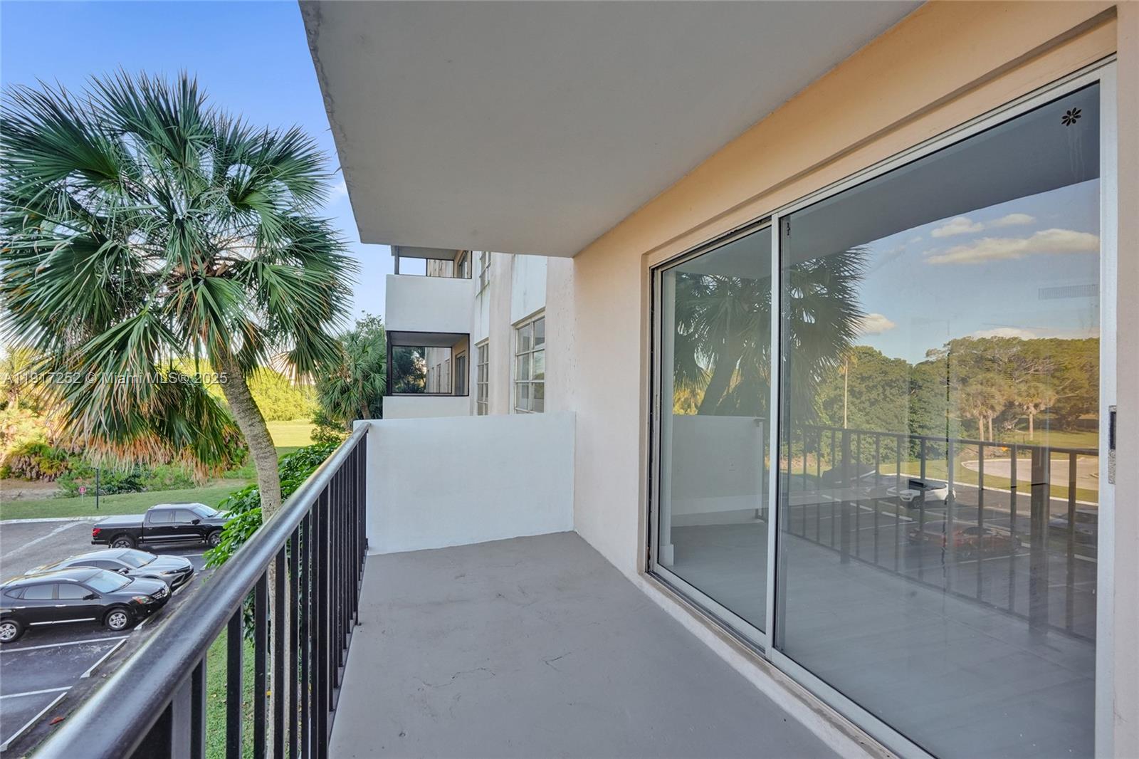 4164 Inverrary Drive, Unit 305 Lauderhill, FL 33319 - Photo 35 of 40 a porch with a yard