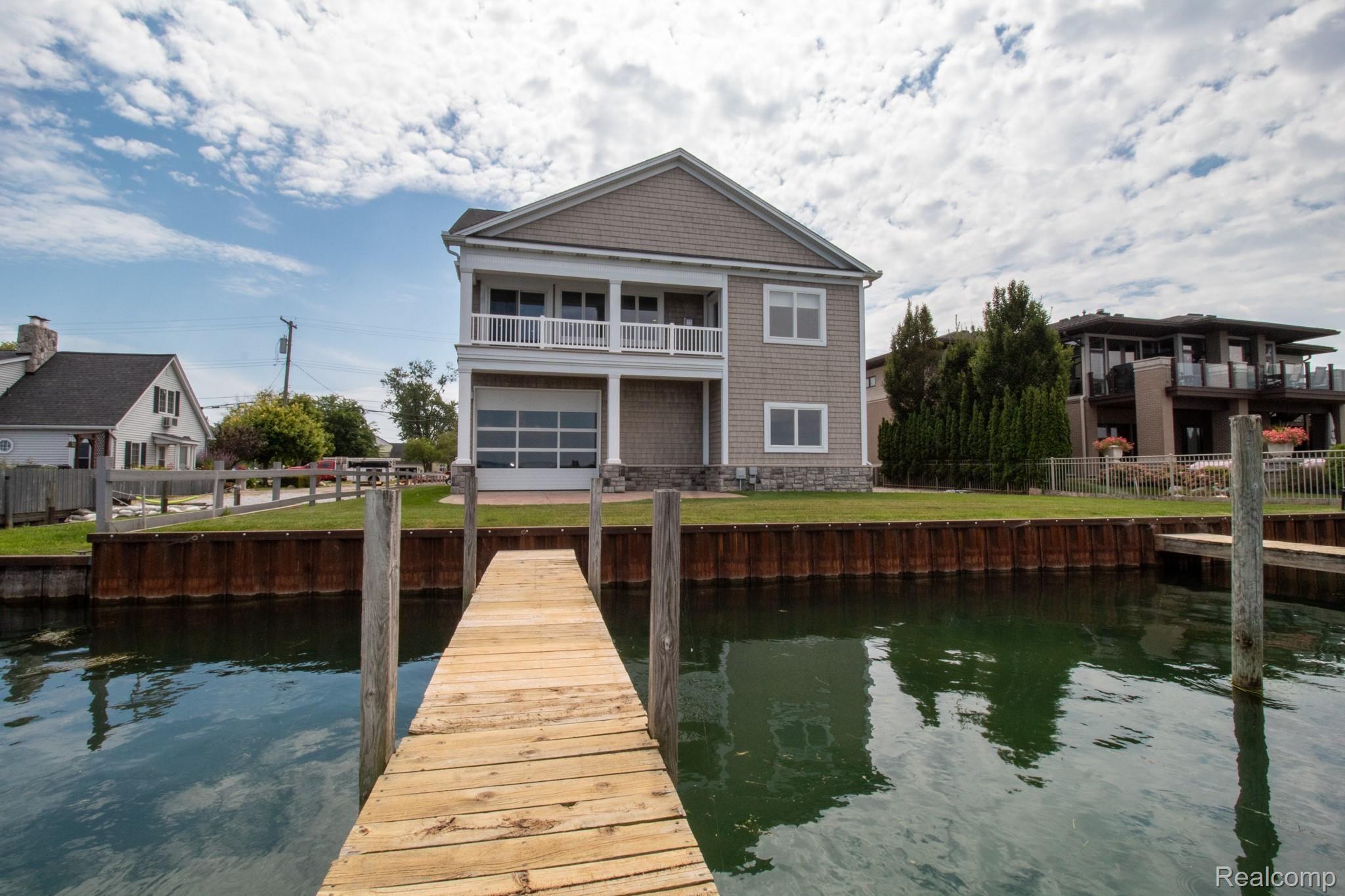 32171 North River Road Harrison Township, MI 48045 - Photo 8 of 52 Back of house from dock.jpg