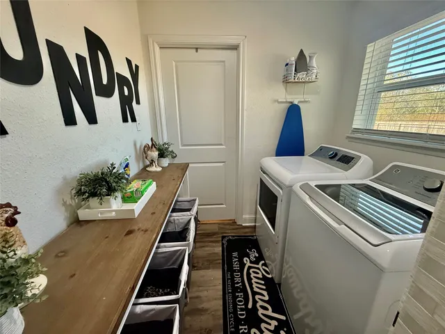 a view of a room with washer and dryer