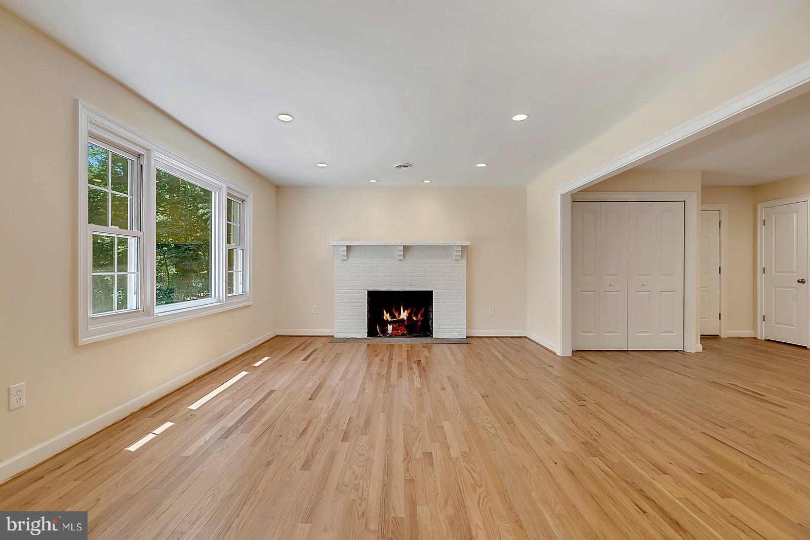 7699 Kennedy Road Nokesville, VA 20181 - Photo 4 of 40 Living room with fireplace and hardwood floors