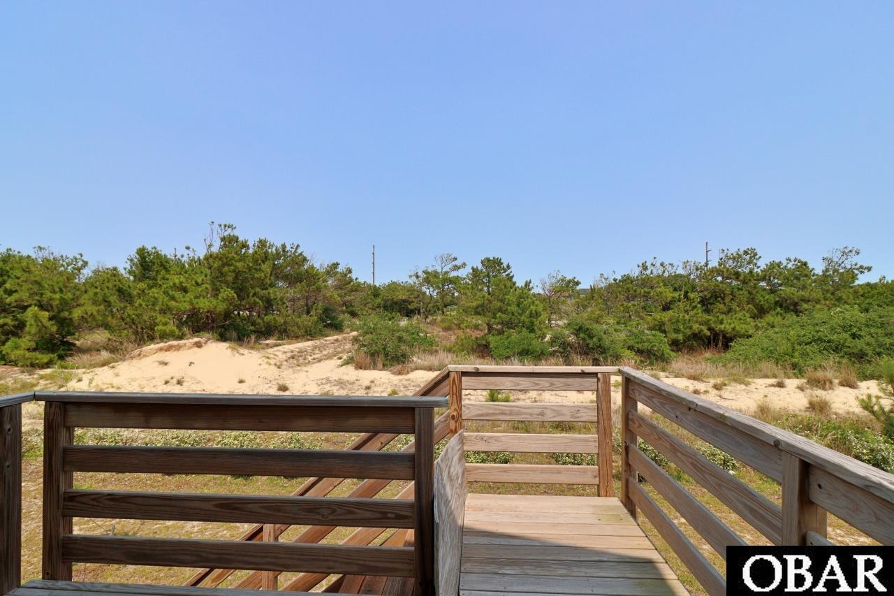 303 Ridgeview Way, Unit 23 Nags Head, NC 27959 - Photo 15 of 50 Back deck off of the kitchen