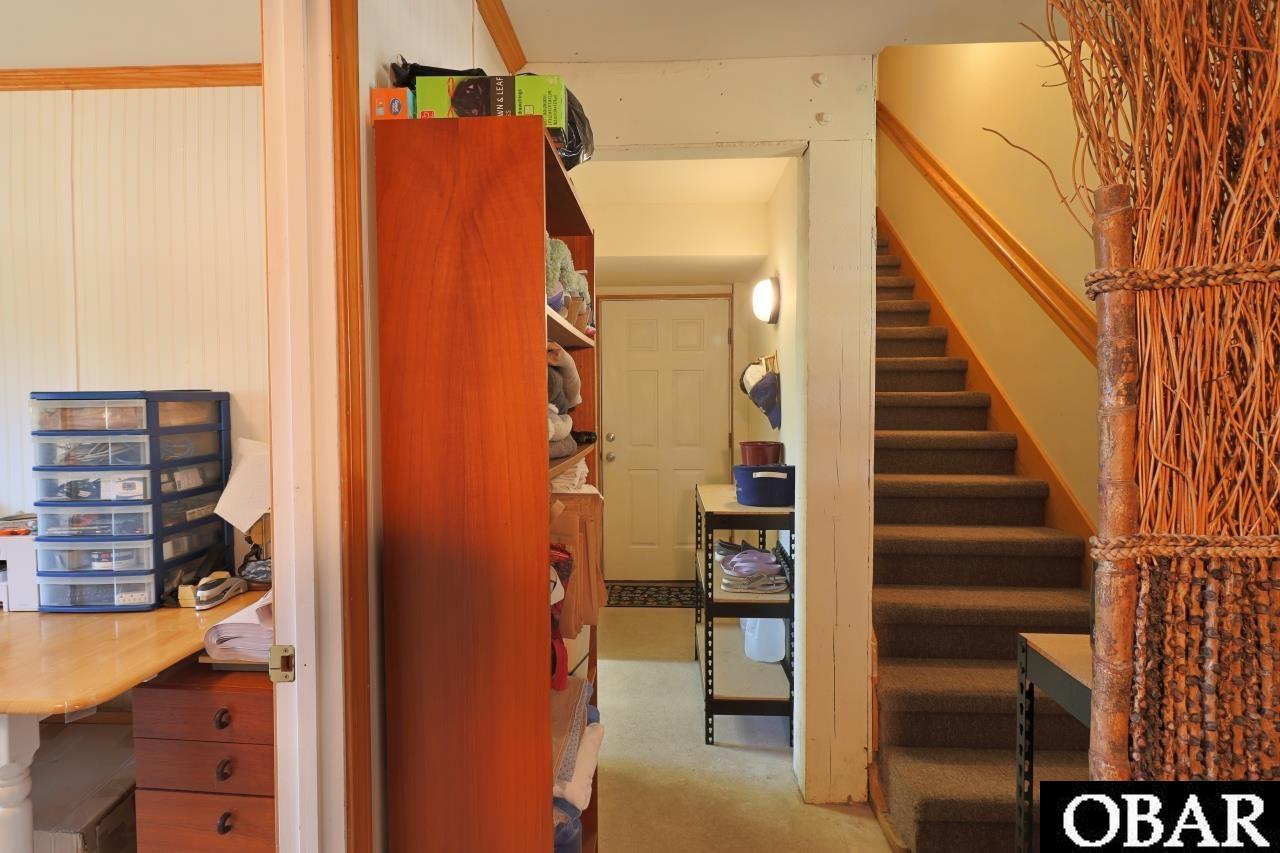 303 Ridgeview Way, Unit 23 Nags Head, NC 27959 - Photo 33 of 50 1st floor ground level entrance from carport