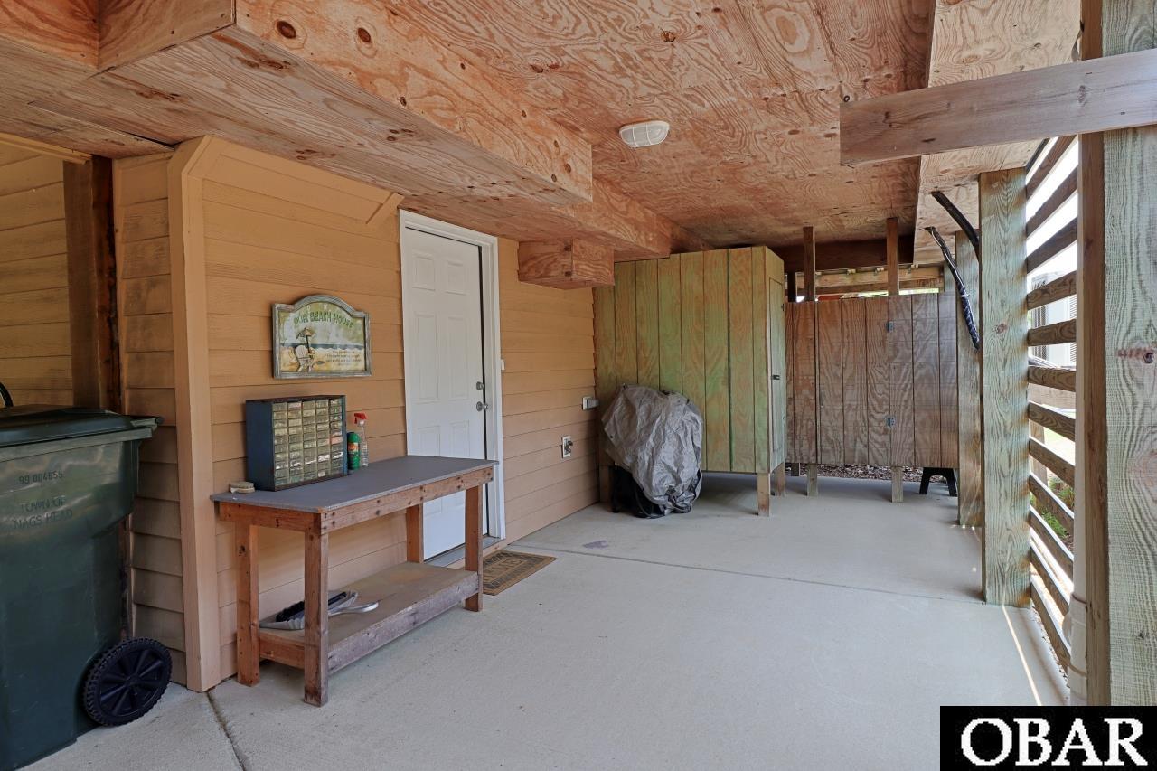 303 Ridgeview Way, Unit 23 Nags Head, NC 27959 - Photo 37 of 50 Carport entrance