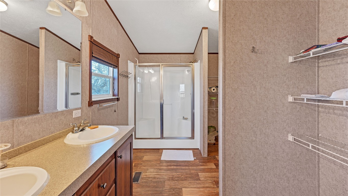 154 Cowboy Road Gonzales, TX 78629 - Photo 20 of 39 a bathroom with a sink a toilet and shower