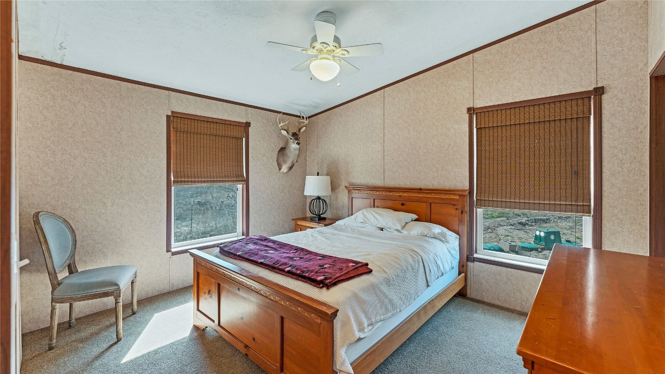 154 Cowboy Road Gonzales, TX 78629 - Photo 25 of 39 a bedroom with a bed and window