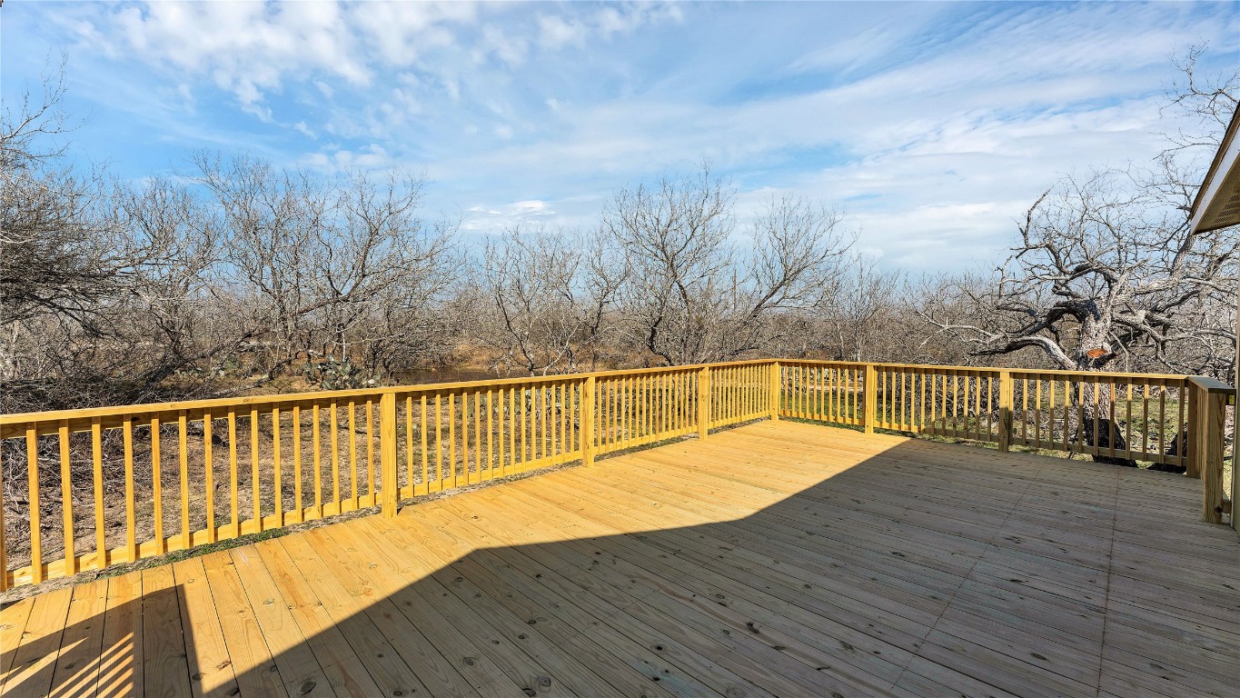 154 Cowboy Road Gonzales, TX 78629 - Photo 27 of 39 a view of balcony with wooden floor