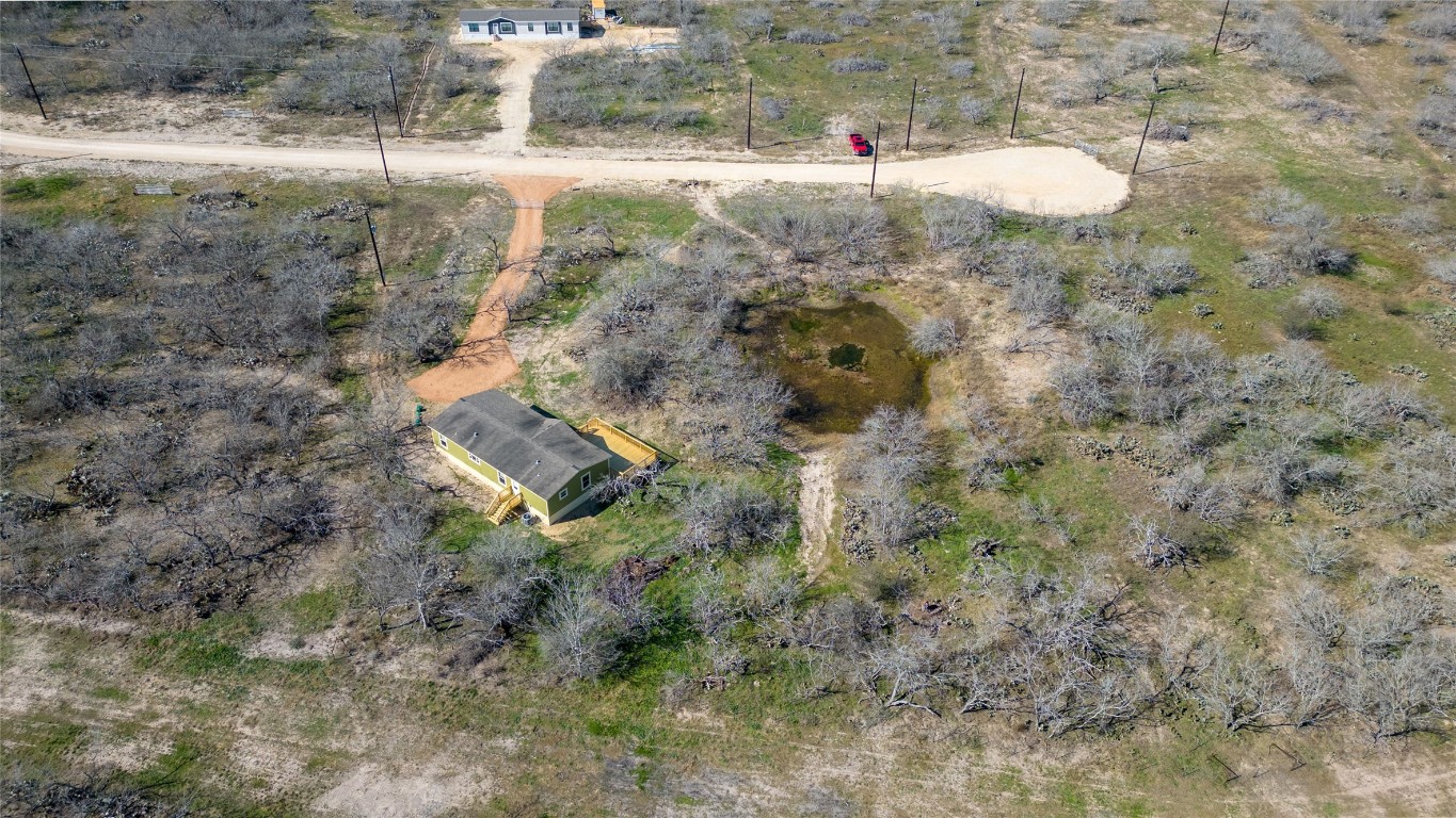 154 Cowboy Road Gonzales, TX 78629 - Photo 36 of 39 a view of outdoor space and covered with trees