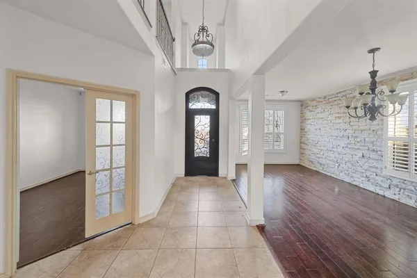 a view of livingroom with hardwood floor and hallway