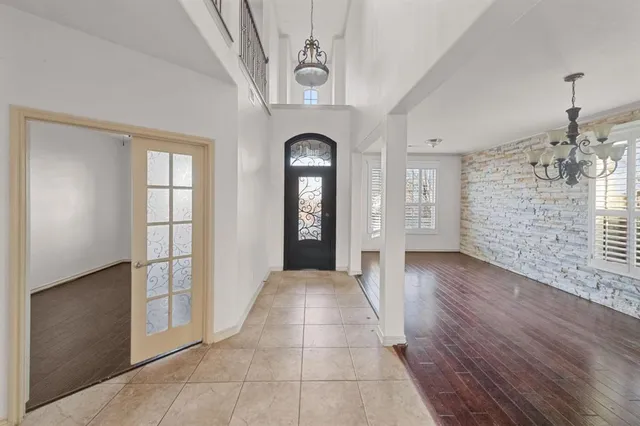 a view of livingroom with hardwood floor and hallway
