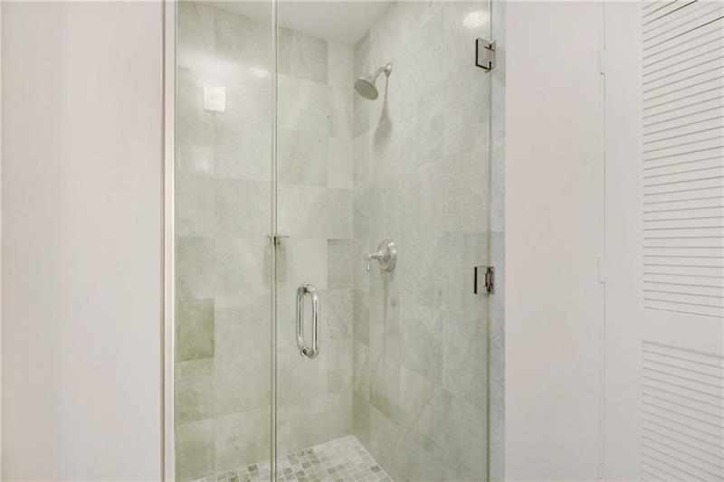 1050 Brickell Avenue, Unit 3222 Miami, FL 33131 - Photo 11 of 12 a bathroom with a shower