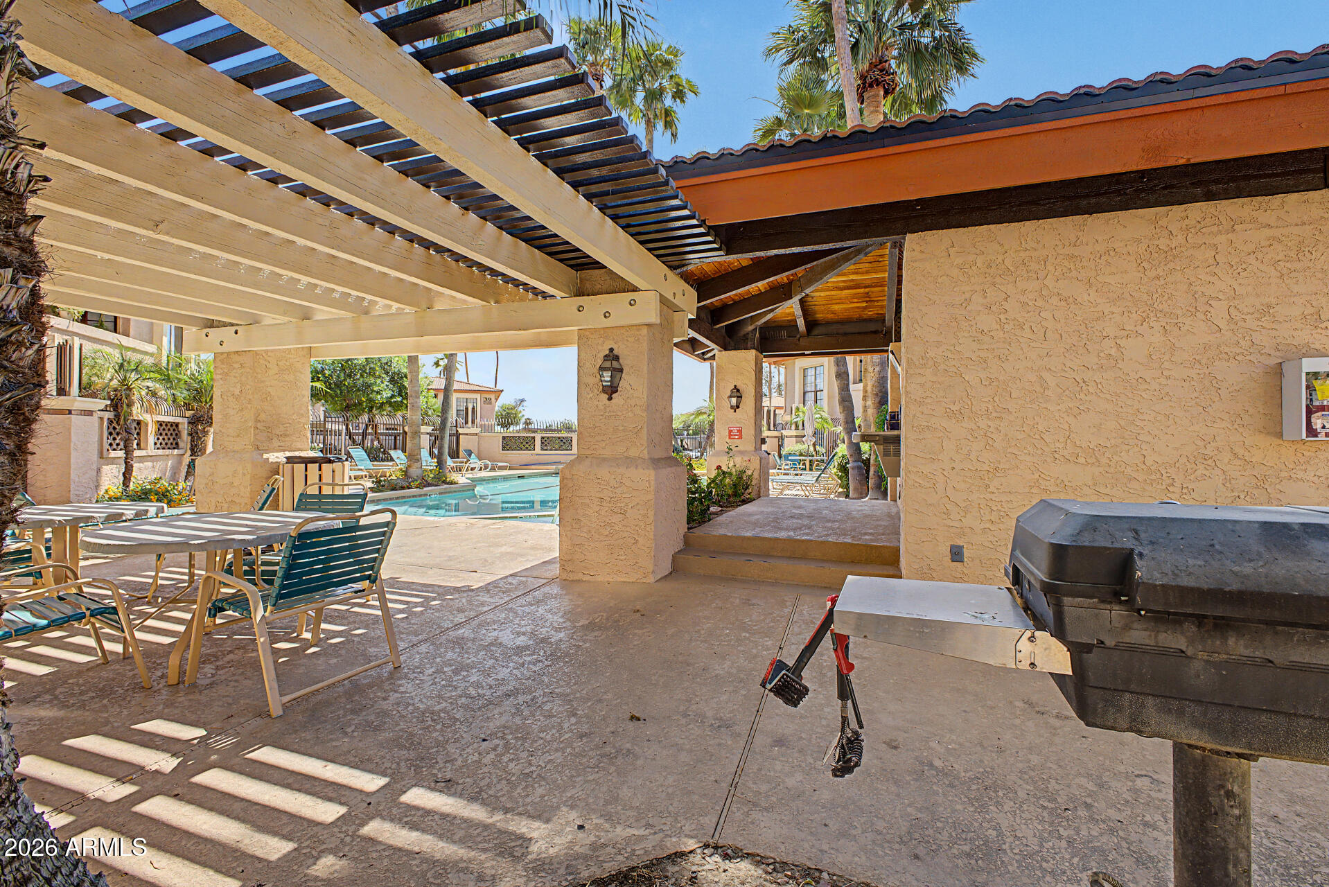 10410 North Cave Creek Road, Unit 1027 Phoenix, AZ 85020 - Photo 25 of 37 a living room with furniture a rug and a table