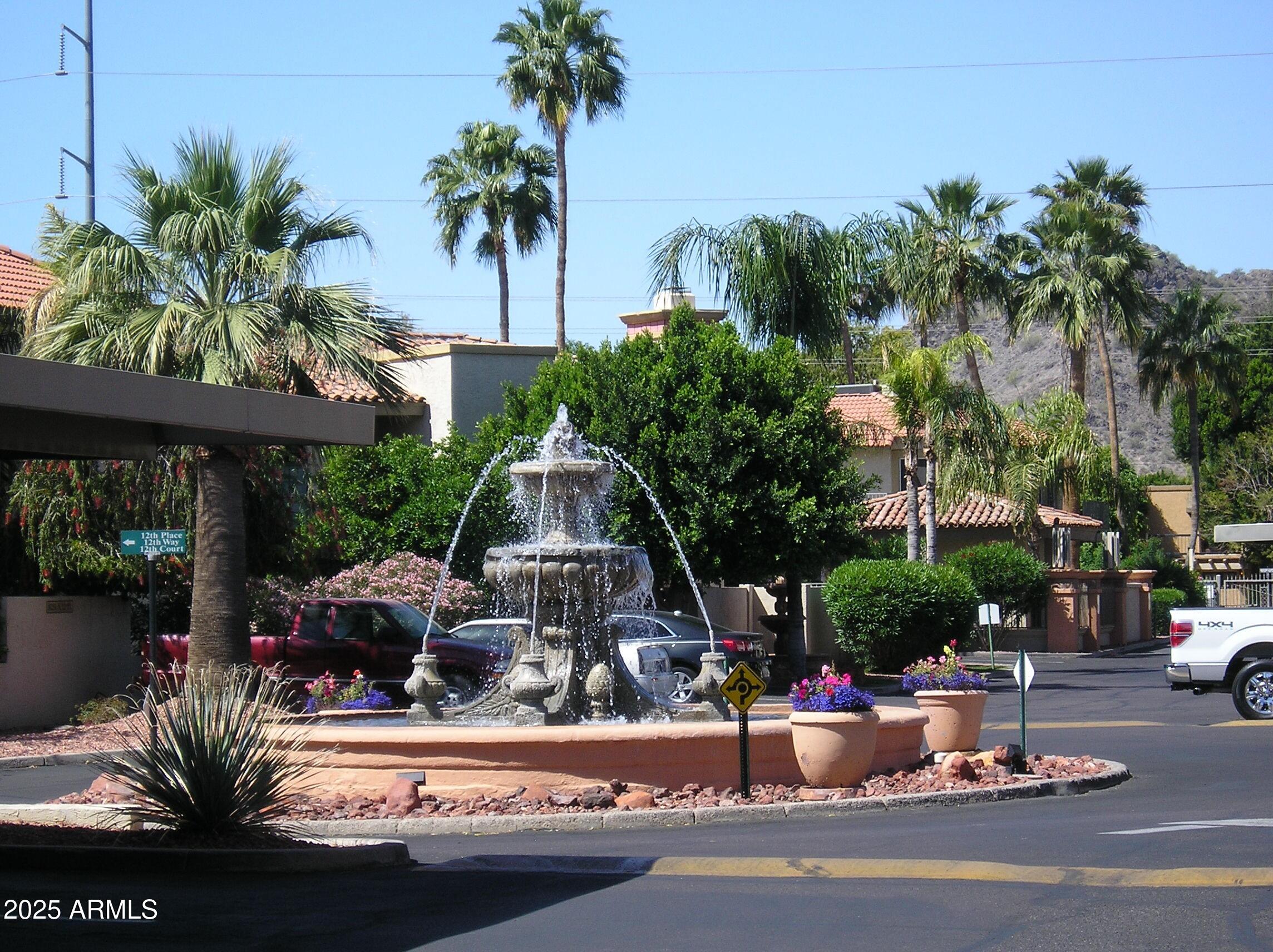 10410 North Cave Creek Road, Unit 1027 Phoenix, AZ 85020 - Photo 28 of 37 a view of a swimming pool with a patio