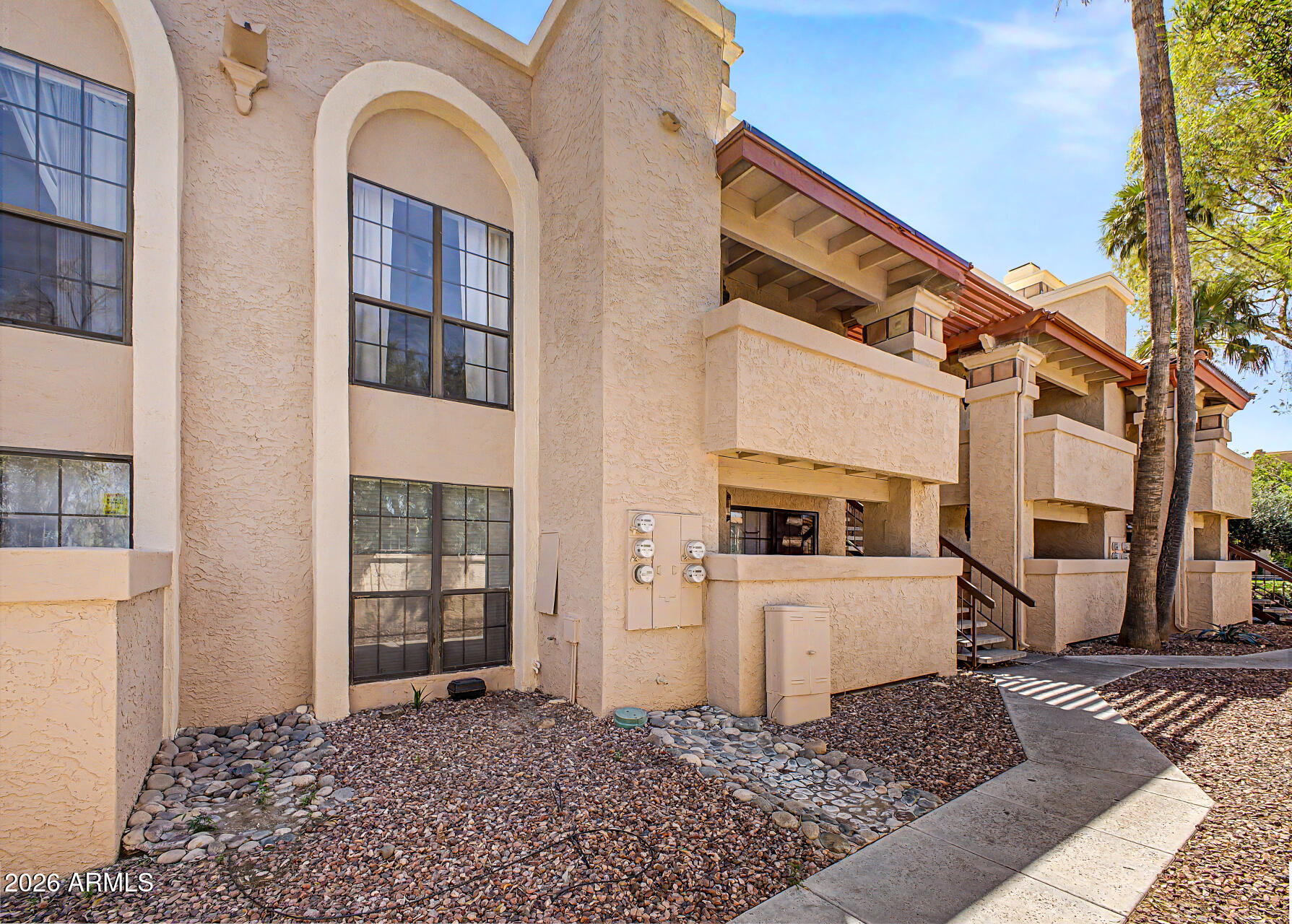 10410 North Cave Creek Road, Unit 1027 Phoenix, AZ 85020 - Photo 36 of 37 a view of a grey house with windows