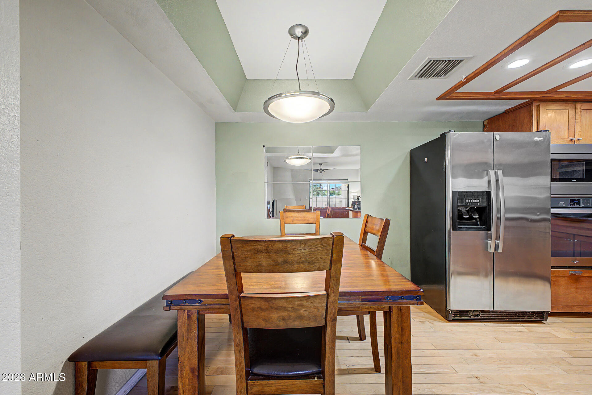 10410 North Cave Creek Road, Unit 1027 Phoenix, AZ 85020 - Photo 6 of 37 a view of a dining room with furniture