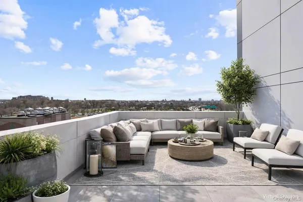 a view of a balcony with city view