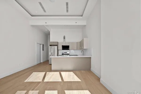 a view of an empty room and window